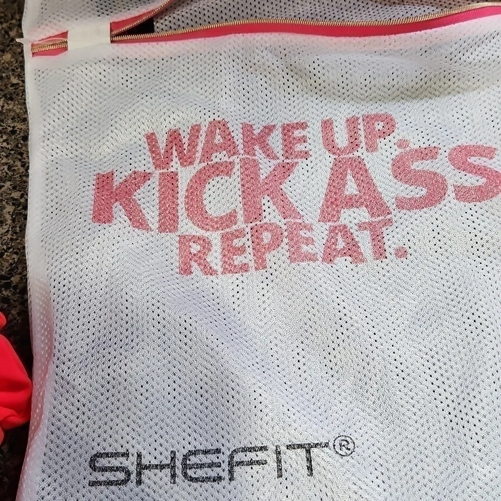 Shefit pocket leggings size medium bright fun fitness with scrunchis and laundry